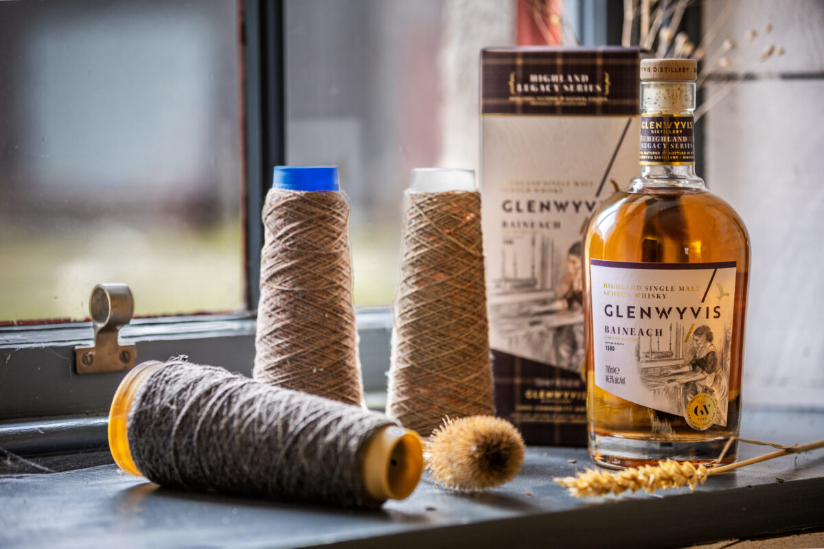 Bottle of Baineach whisky with yarn taken at Knockando Wooolmill